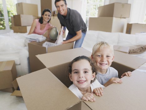 Moving van and helper supporting a local Barnes relocation