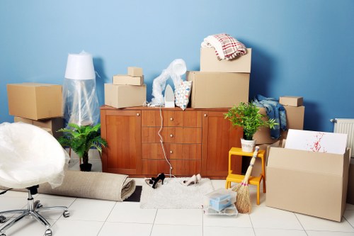 Office removals in Barnes with moving boxes and desks prepared for relocation