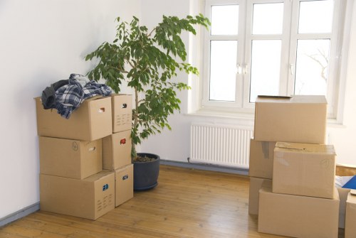 Collection team loading bulky furniture in Barnes