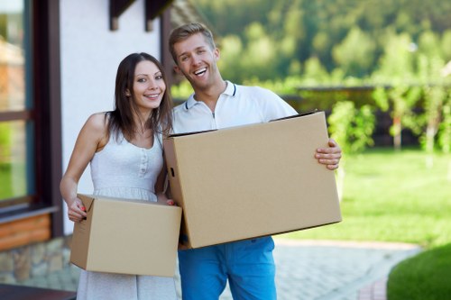 Organized moving boxes labeled for a smooth relocation in Barnes