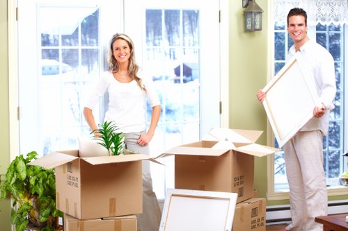 Local removals team handling a Barnes apartment move