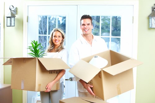 Packed office boxes and furniture ready for a Barnes commercial move