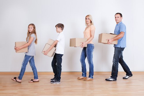 Local movers loading items for a Barnes relocation