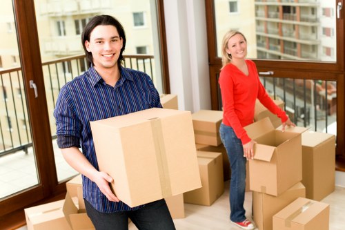 Moving van and packing boxes for removals in Barnes